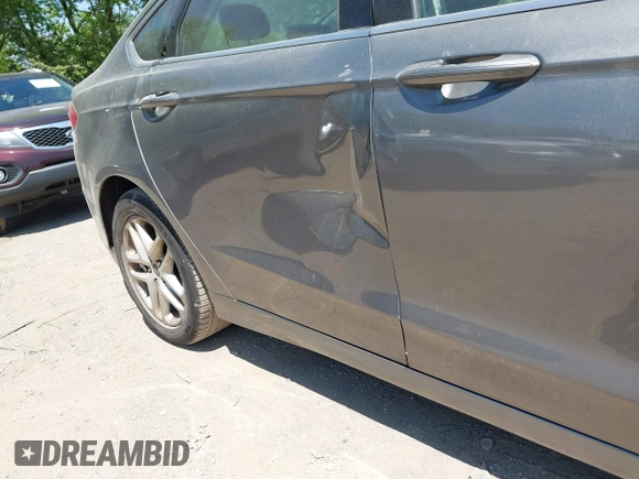 2014 Ford Fusion SE with VIN 3FA6P0HD7ER328428, listed as a IAAI auction lot 42242714 with 74,199 mi miles and . Bid and sale history available at DreamBid. Image 13.