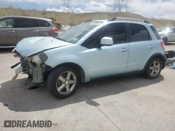 2009 Suzuki SX4 Touring AWD z VIN JS2YB417396203092, wystawiony jako Copart lot #53965685 z przebiegiem 153 701 mil mil oraz Szkoda całkowita • Salvage title. Historia ofert i sprzedaży dostępna na DreamBid. Obrazek 1.