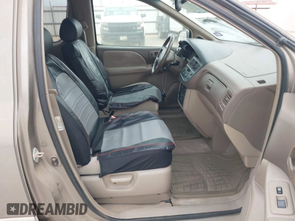 1999 Toyota Sienna LE with VIN 4T3ZF13C5XU164075, listed as a IAAI auction lot 42063741 with 93,407 mi miles. Bid and sale history available at carsss.com. Image 5.