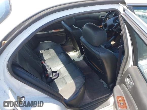 1998 Nissan Maxima GXE z VIN JN1CA21D6WT510015, wystawiony jako IAAI lot #42004731 z przebiegiem 114 575 mil mil oraz . Historia ofert i sprzedaży dostępna na DreamBid. Obrazek 8.