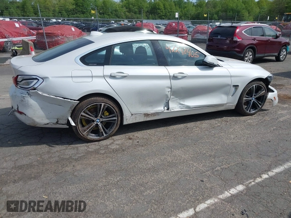 2019 BMW 4 Series 430i xDrive z VIN WBA4J3C55KBL08387, wystawiony jako IAAI lot #42248405 z przebiegiem 115 017 mil mil oraz . Historia ofert i sprzedaży dostępna na DreamBid. Obrazek 13.