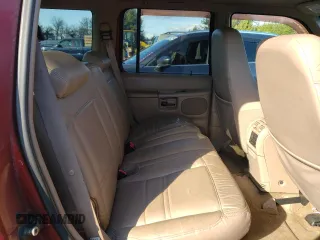 1999 Ford Explorer XLT with VIN 1FMDU34E7XZA60386, listed as a Copart auction lot 86851594 with 218,592 mi miles and Salvage title. Bid and sale history available at DreamBid. Image 10.