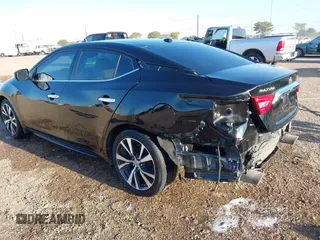 2016 Nissan Maxima SL with VIN 1N4AA6AP6GC902182, listed as a IAAI auction lot 41963457 with 63,912 mi miles and . Bid and sale history available at DreamBid. Image 6.