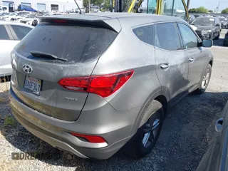 2018 Hyundai Santa Fe 2.4L with VIN 5NMZT3LB8JH076788, listed as a IAAI auction lot 42421969 with 49,689 mi miles and . Bid and sale history available at DreamBid. Image 4.