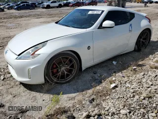2014 Nissan 370Z Touring with VIN JN1AZ4EH0EM636520, listed as a Copart auction lot 73661434 with 0 mi miles and Salvage Title. Bid and sale history available at carsss.com. Image 1.