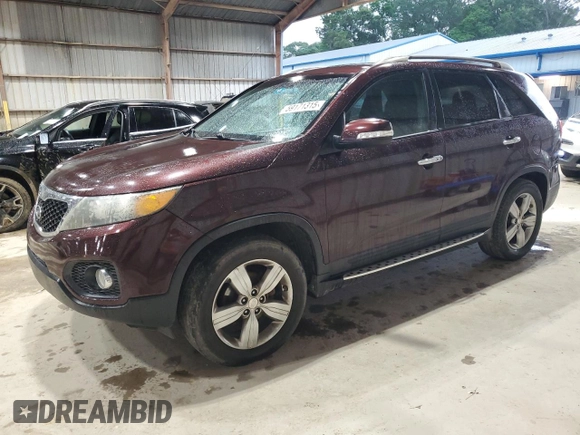 2012 Kia Sorento EX z VIN 5XYKU4A64CG219646, wystawiony jako Copart lot #59171315 z przebiegiem 185 806 mil mil oraz Czysty tytuł • Clean title. Historia ofert i sprzedaży dostępna na DreamBid. Obrazek 1.
