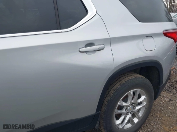 2021 Chevrolet Traverse LT Leather with VIN 1GNERHKW3MJ214421, listed as a IAAI auction lot 42026355 with 999,999 mi miles. Bid and sale history available at carsss.com. Image 6.