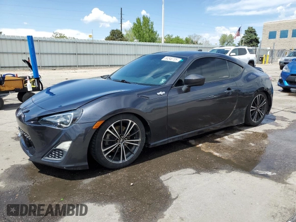 2015 Scion FR-S z VIN JF1ZNAA12F8707784, wystawiony jako Copart lot #56248735 z przebiegiem 119 679 mil mil oraz Szkoda całkowita • Salvage title. Historia ofert i sprzedaży dostępna na DreamBid. Obrazek 1.
