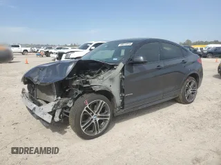 2016 BMW X4 xDrive28i with VIN 5UXXW3C58G0M89813, listed as a Copart auction lot 48014815 with 139,749 mi miles and Salvage Title. Bid and sale history available at carsss.com. Image 1.