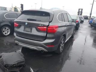 2017 BMW X1 xDrive28i with VIN WBXHT3C32H5F70152, listed as a IAAI auction lot 42184934 with 125,645 mi miles and . Bid and sale history available at DreamBid. Image 4.