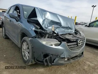 2016 Mazda CX-5 Sport with VIN JM3KE2BY0G0703866, listed as a Copart auction lot 43708185 with 186,790 mi miles and Salvage Title. Bid and sale history available at carsss.com. Image 11.