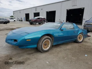 1992 Pontiac Firebird with VIN 1G2FS23E0NL204864, listed as a Copart auction lot 56180995 with 117,065 mi miles and Non repairable. Bid and sale history available at DreamBid. Image 1.