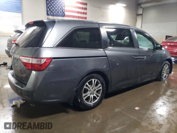 2012 Honda Odyssey EX-L with VIN 5FNRL5H69CB143572, listed as a Copart auction lot 48614255 with 114,490 mi miles and Salvage Title. Bid and sale history available at carsss.com. Image 3.
