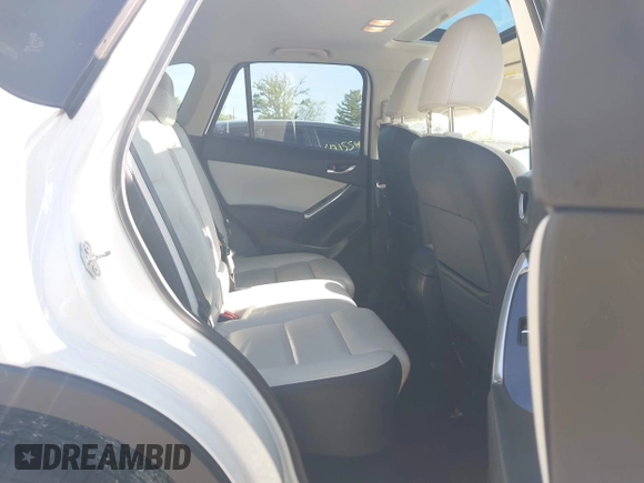 2016 Mazda CX-5 Grand Touring with VIN JM3KE4DY1G0680431, listed as a IAAI auction lot 42136637 with 166,348 mi miles. Bid and sale history available at carsss.com. Image 8.