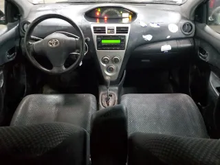 2007 Toyota Yaris with VIN JTDBT923571109568, listed as a Copart auction lot 45751305 with 124,836 mi miles and Salvage Title. Bid and sale history available at DreamBid. Image 8.