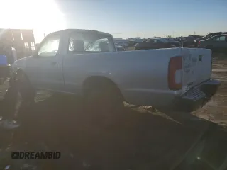 1999 Nissan Frontier XE with VIN 1N6DD21S4XC341893, listed as a Copart auction lot 42508815 with 86,040 mi miles and Salvage title. Bid and sale history available at DreamBid. Image 2.