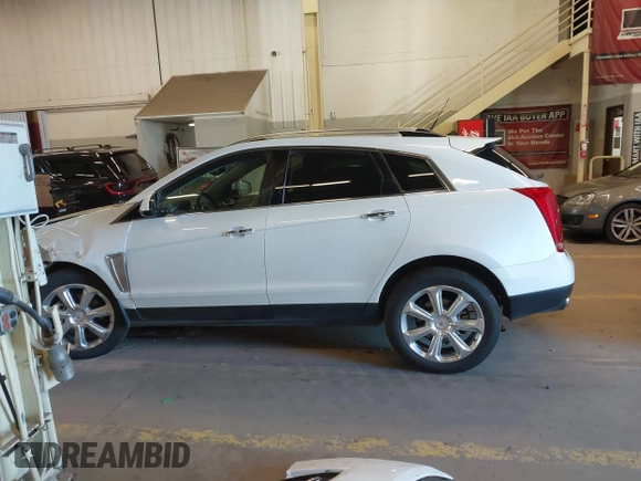 2013 Cadillac SRX Premium Collection с VIN 3GYFNEE33DS574080, выставлен на аукционе IAAI как лот 42166048 с пробегом 109 393 миль миль и . История ставок и продаж доступна на DreamBid. Изображение 15.