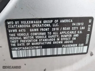 2012 Volkswagen Passat SEL with VIN 1VWCP7A34CC079912, listed as a IAAI auction lot 41993331 with 114,110 mi miles. Bid and sale history available at carsss.com. Image 9.