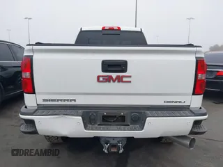 2015 GMC Sierra 2500HD Denali with VIN 1GT120E85FF681680, listed as a IAAI auction lot 42081711 with 67,676 mi miles and . Bid and sale history available at DreamBid. Image 16.