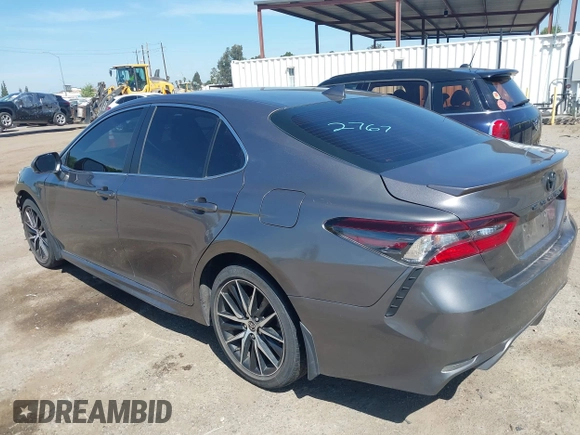 2023 Toyota Camry SE with VIN 4T1G11AK2PU079820, listed as a IAAI auction lot 42003967 with 39,077 mi miles. Bid and sale history available at carsss.com. Image 3.