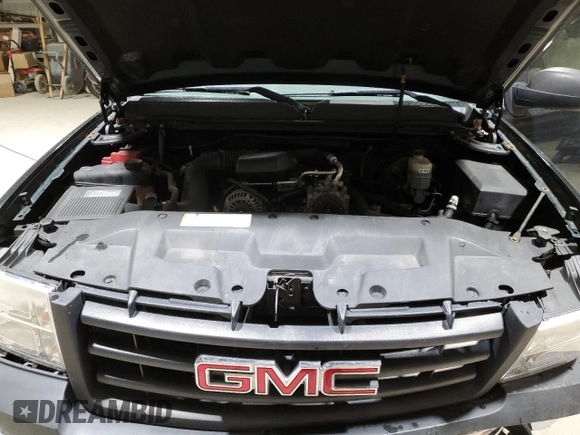 2011 GMC Sierra 1500 Work Truck z VIN 1GTN1TEX9BZ137849, wystawiony jako Copart lot #50036775 z przebiegiem 92 033 mil mil oraz Szkody całkowita. Historia ofert i sprzedaży dostępna na DreamBid. Obrazek 13.