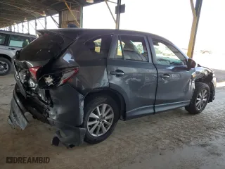2014 Mazda CX-5 Touring with VIN JM3KE4CY1E0394643, listed as a Copart auction lot 50274515 with 147,294 mi miles and Salvage Title. Bid and sale history available at carsss.com. Image 3.