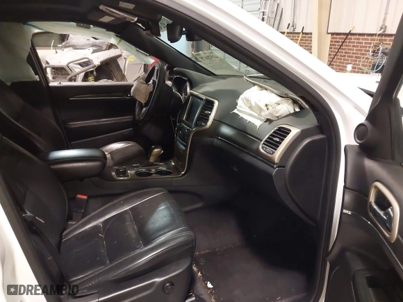 2016 Jeep Grand Cherokee Limited 75th Anniversary with VIN 1C4RJFBT9GC448406, listed as a IAAI auction lot 41521175 with 137,552 mi miles. Bid and sale history available at carsss.com. Image 5.