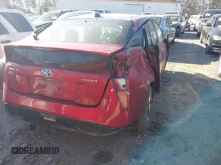2016 Toyota Prius Four with VIN JTDKARFU3G3526524, listed as a IAAI auction lot 41798589 with 115,956 mi miles and . Bid and sale history available at DreamBid. Image 4.