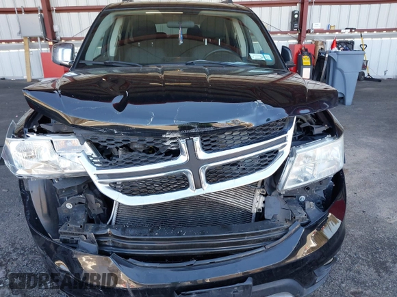 2014 Dodge Journey SXT z VIN 3C4PDDBG5ET212018, wystawiony jako IAAI lot #41737808 z przebiegiem 109 847 mil mil oraz . Historia ofert i sprzedaży dostępna na DreamBid. Obrazek 6.