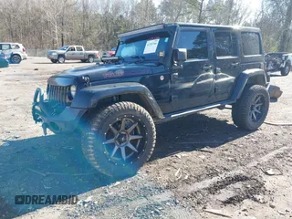 2015 Jeep Wrangler Unlimited Rubicon with VIN 1C4BJWFG9FL755152, listed as a IAAI auction lot 41293766 with 109,153 mi miles. Bid and sale history available at carsss.com. Image 2.