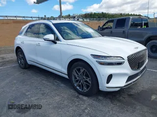 2022 Genesis GV70 2.5T with VIN KMUMADTB7NU073141, listed as a IAAI auction lot 41523721 with 33,986 mi miles and . Bid and sale history available at DreamBid. Image 1.