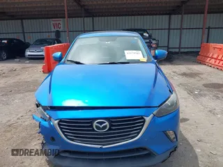 2016 Mazda CX-3 Grand Touring z VIN JM1DKFD78G0134173, wystawiony jako IAAI lot #42179942 z przebiegiem 93 539 mil mil oraz . Historia ofert i sprzedaży dostępna na DreamBid. Obrazek 13.