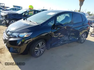 2016 Honda Fit EX with VIN JHMGK5H75GX006464, listed as a IAAI auction lot 41852218 with 30,990 mi miles and . Bid and sale history available at DreamBid. Image 2.
