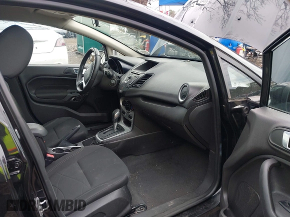 2015 Ford Fiesta SE with VIN 3FADP4EJ9FM175123, listed as a IAAI auction lot 41948452 with 130,801 mi miles. Bid and sale history available at carsss.com. Image 5.