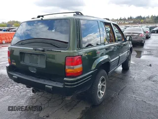 1996 Jeep Grand Cherokee Limited with VIN 1J4GZ78S0TC235692, listed as a IAAI auction lot 41945617 with Not provided miles and . Bid and sale history available at DreamBid. Image 4.
