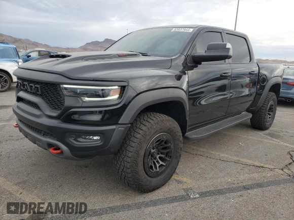 2024 Ram 1500 TRX with VIN 1C6SRFU94RN135421, listed as a Copart auction lot 82037944 with 6,969 mi miles and Salvage Title. Bid and sale history available at carsss.com. Image 1.