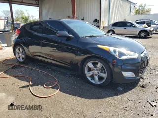 2014 Hyundai Veloster with VIN KMHTC6AD0EU207850, listed as a Copart auction lot 46986695 with 138,024 mi miles and Salvage Title. Bid and sale history available at carsss.com. Image 4.