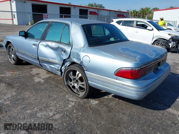 1997 Mercury Grand Marquis LS with VIN 2MELM75W7VX708034, listed as a IAAI auction lot 41878938 with 197,818 mi miles and . Bid and sale history available at DreamBid. Image 3.