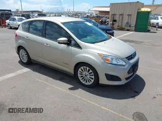 2018 Ford C-Max SE with VIN 1FADP5AU7JL105118, listed as a IAAI auction lot 42085019 with 71,019 mi miles. Bid and sale history available at carsss.com. Image 1.