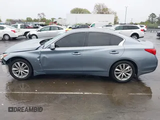 2015 Infiniti Q50 Premium with VIN JN1BV7AR4FM393974, listed as a IAAI auction lot 41874345 with 148,228 mi miles. Bid and sale history available at carsss.com. Image 14.