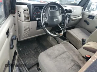 2004 Jeep Wrangler Rubicon with VIN 1J4FA69S74P787812, listed as a Copart auction lot 84715464 with 150,320 mi miles and Salvage Title. Bid and sale history available at carsss.com. Image 8.