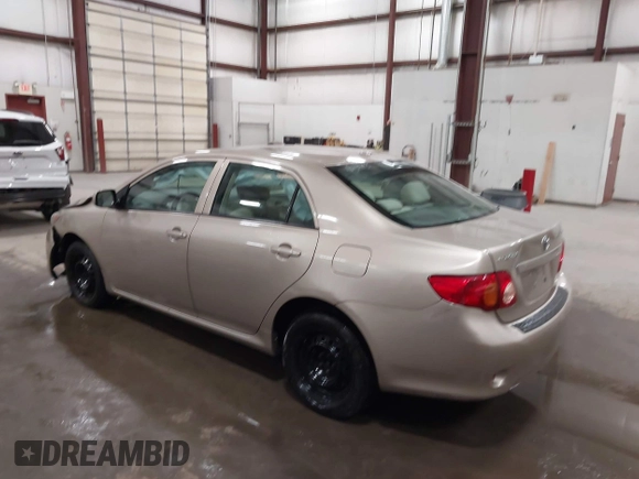 2009 Toyota Corolla with VIN 1NXBU40E19Z014460, listed as a IAAI auction lot 41973023 with 74,927 mi miles. Bid and sale history available at carsss.com. Image 3.