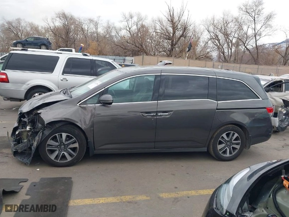 2015 Honda Odyssey Touring Elite with VIN 5FNRL5H94FB031342, listed as a IAAI auction lot 41112966 with NaN miles. Bid and sale history available at carsss.com. Image 14.