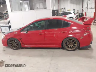 2015 Subaru WRX Premium with VIN JF1VA1D66F8804732, listed as a IAAI auction lot 41558676 with 142,471 mi miles. Bid and sale history available at carsss.com. Image 14.