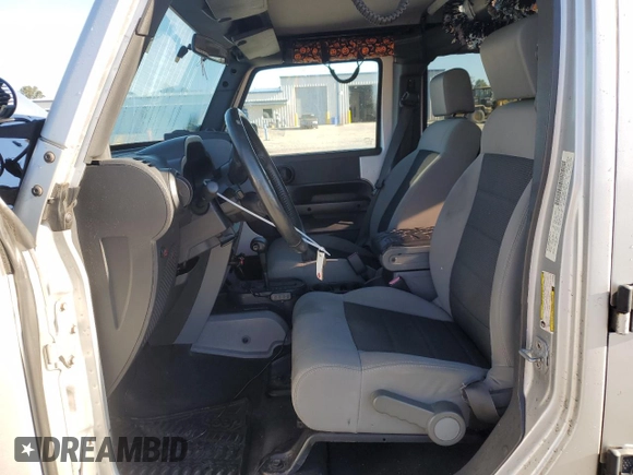 2008 Jeep Wrangler Unlimited X with VIN 1J4GB39138L517920, listed as a Copart auction lot 76541144 with 213,002 mi miles and Salvage Title. Bid and sale history available at DreamBid. Image 7.