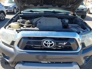 2014 Toyota Tacoma PreRunner with VIN 3TMJU4GN3EM165840, listed as a IAAI auction lot 41666871 with 150,333 mi miles and . Bid and sale history available at DreamBid. Image 10.