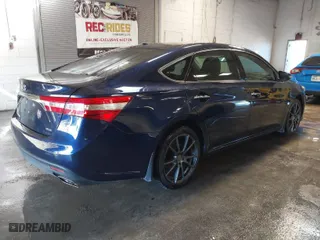 2013 Toyota Avalon XLE with VIN 4T1BK1EB3DU030963, listed as a IAAI auction lot 41356318 with 162,599 mi miles. Bid and sale history available at carsss.com. Image 4.