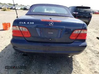 2000 Mercedes-Benz CLK 320/430 z VIN WDBLK70G9YT053107, wystawiony jako Copart lot #54883225 z przebiegiem 374 260 mil mil oraz Szkoda całkowita • Salvage title. Historia ofert i sprzedaży dostępna na DreamBid. Obrazek 6.
