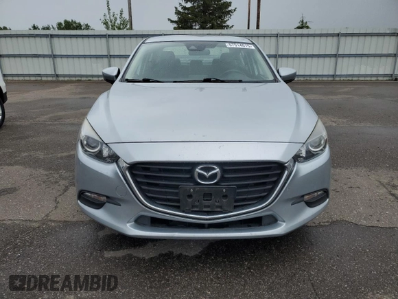 2018 Mazda 3 Touring z VIN 3MZBN1V38JM206424, wystawiony jako Copart lot #57914015 z przebiegiem 93 095 mil mil oraz Szkoda całkowita • Salvage title. Historia ofert i sprzedaży dostępna na DreamBid. Obrazek 5.