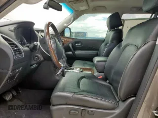 2017 Infiniti QX80 with VIN JN8AZ2NF9H9641338, listed as a Copart auction lot 56565675 with 164,024 mi miles and Salvage title. Bid and sale history available at DreamBid. Image 7.